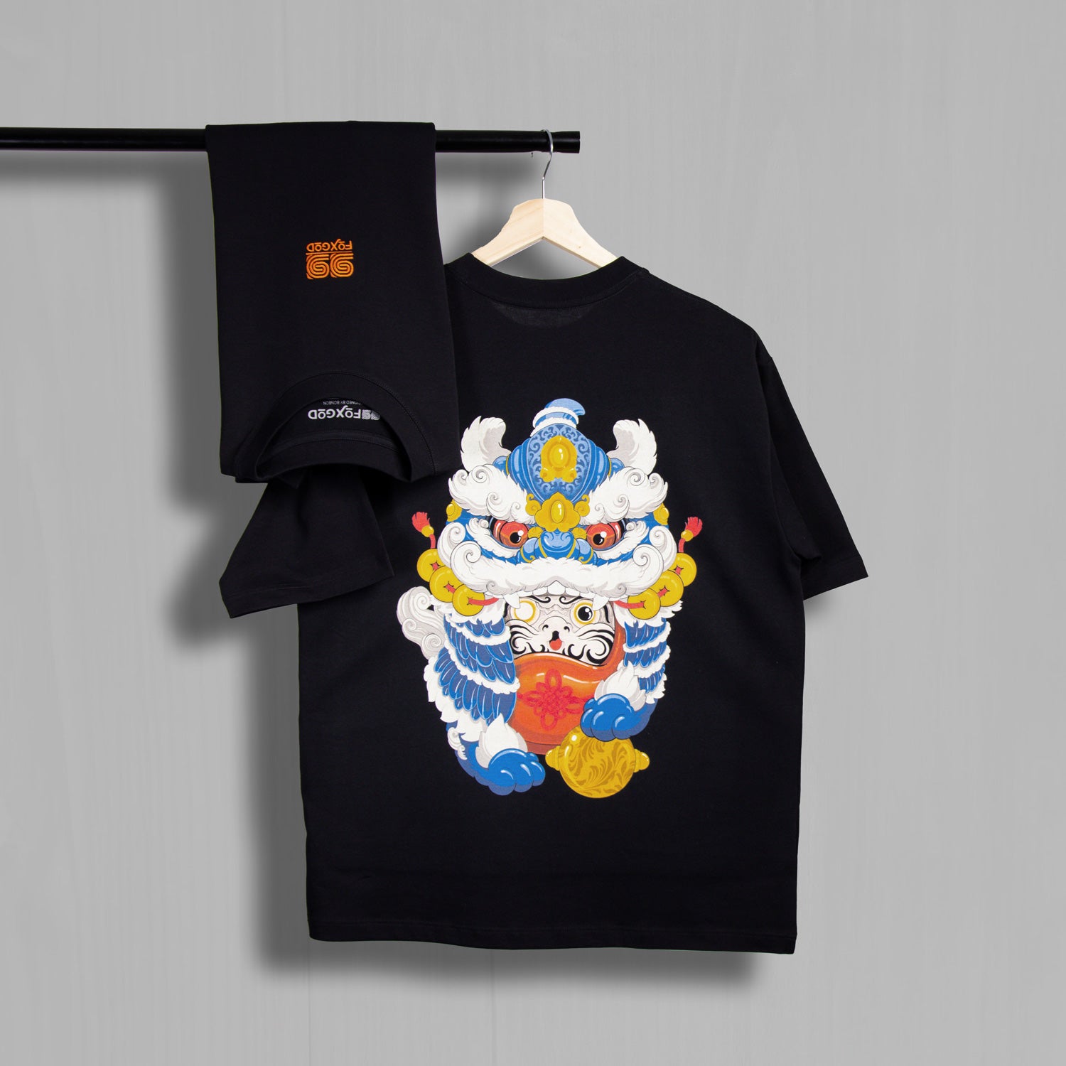 Daruma Doll in blue lion costume tee