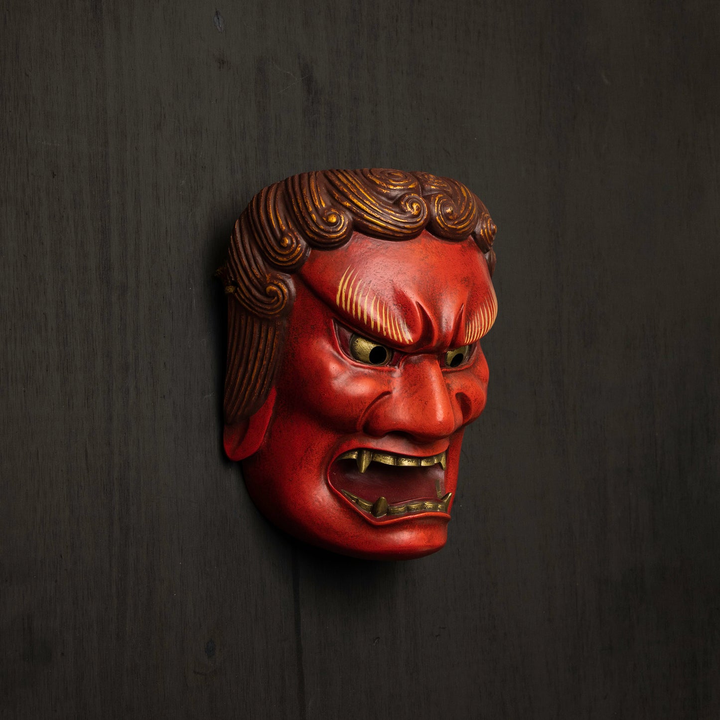 Red Fudo Myo-o Mask on the wall