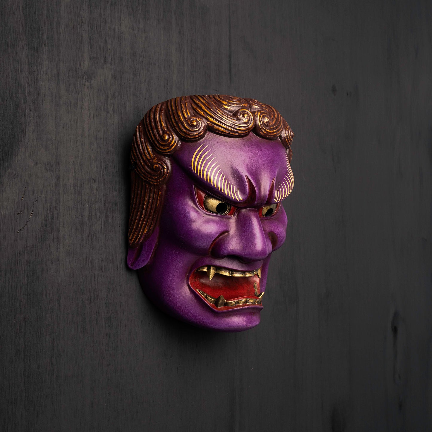 Purple Fudo Myo-o Mask on wall