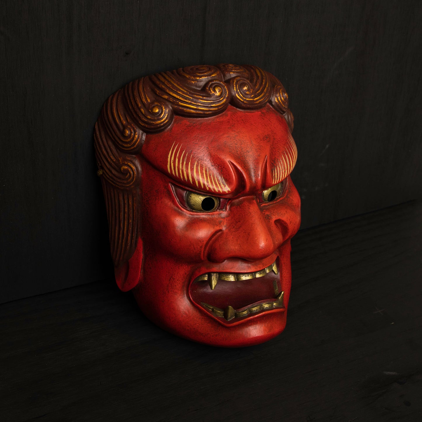 Red Fudo Myo-o Mask on the floor