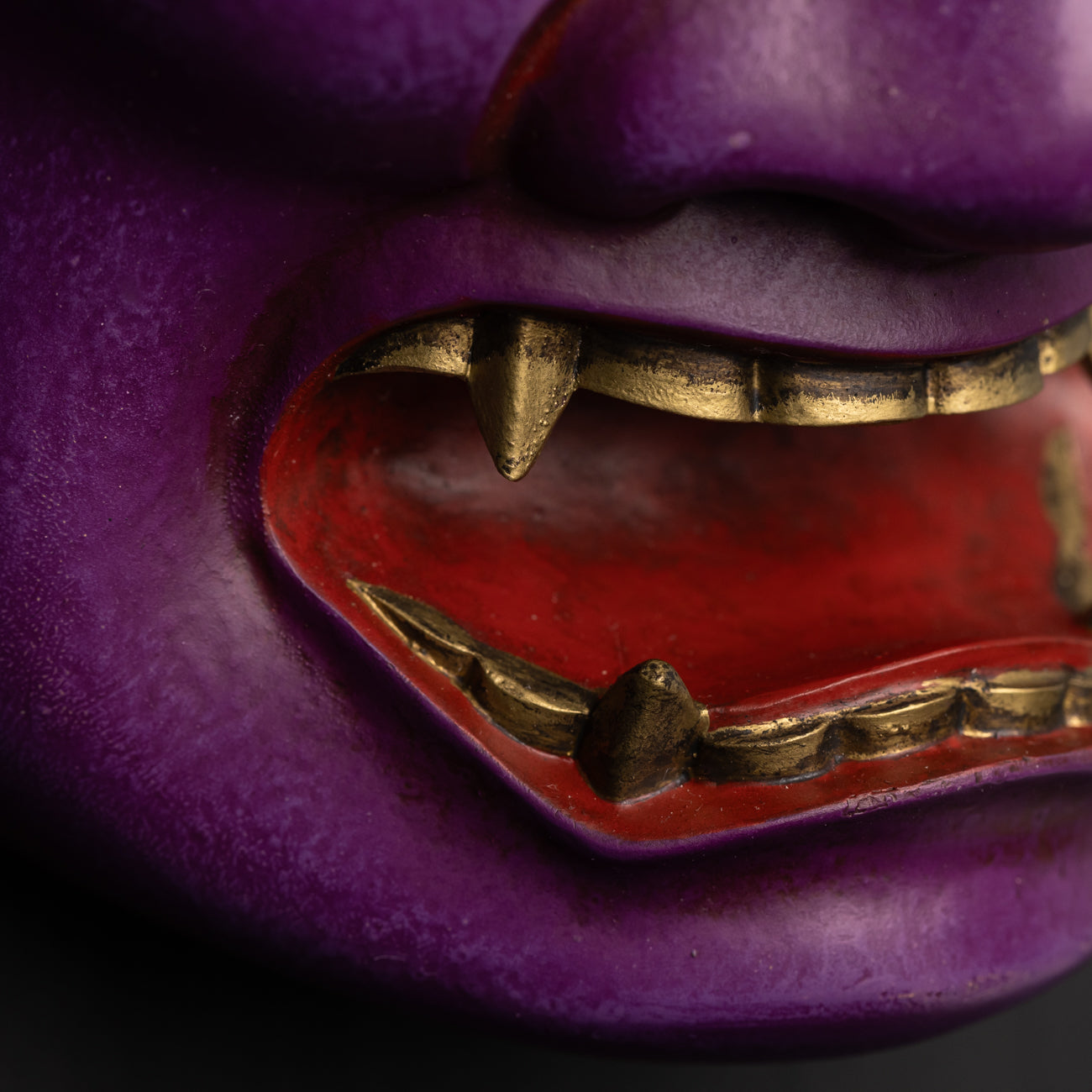 Purple Fudo Myo-o Mask close up on gold fangs