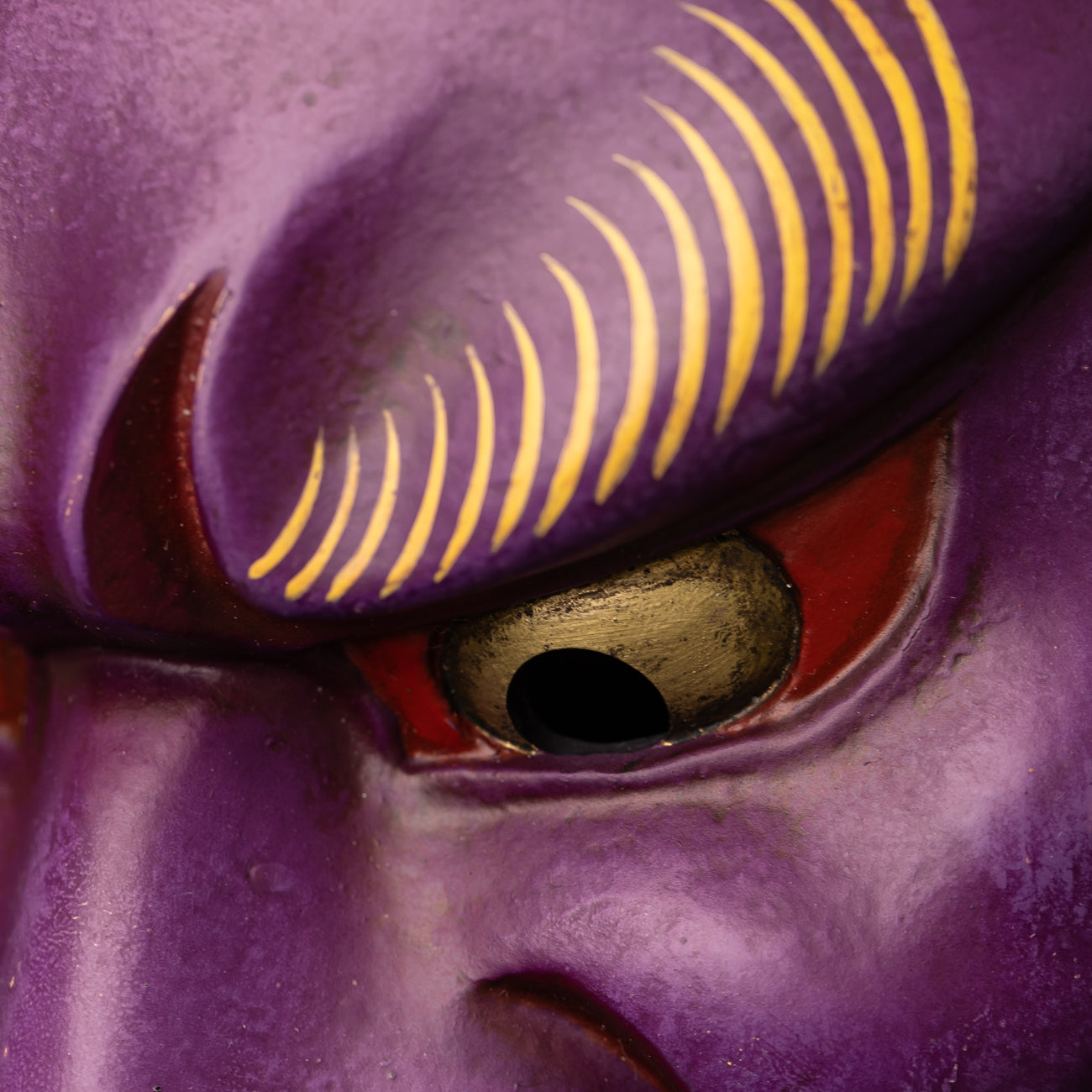 Purple Fudo Myo-o Mask close up on eye