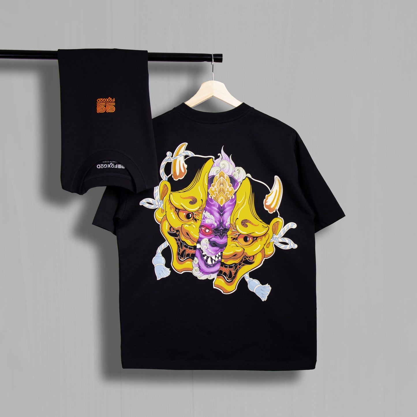 Golden Hannya Mask Shirt on a hanger