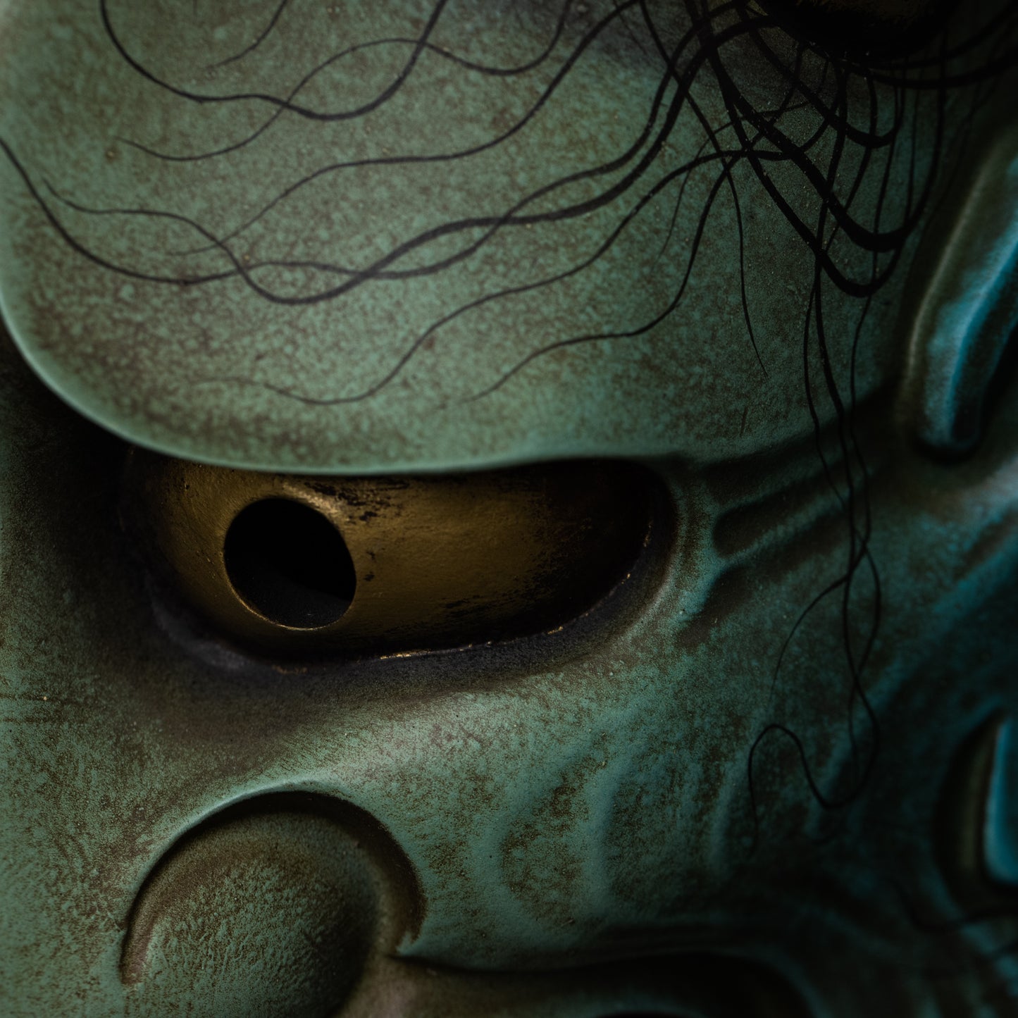 Peacock Blue Hannya Mask close up on eye