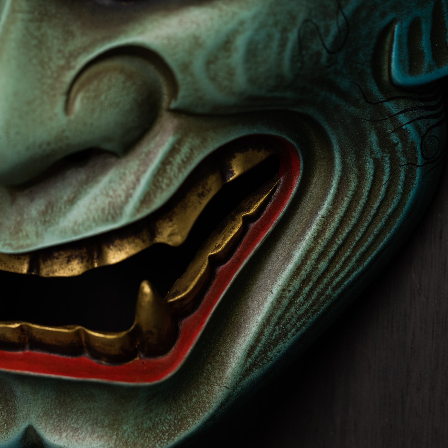 Peacock Blue Hannya Mask close up on gold teeth