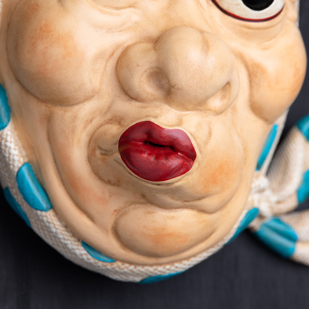 Hyottoko mask.