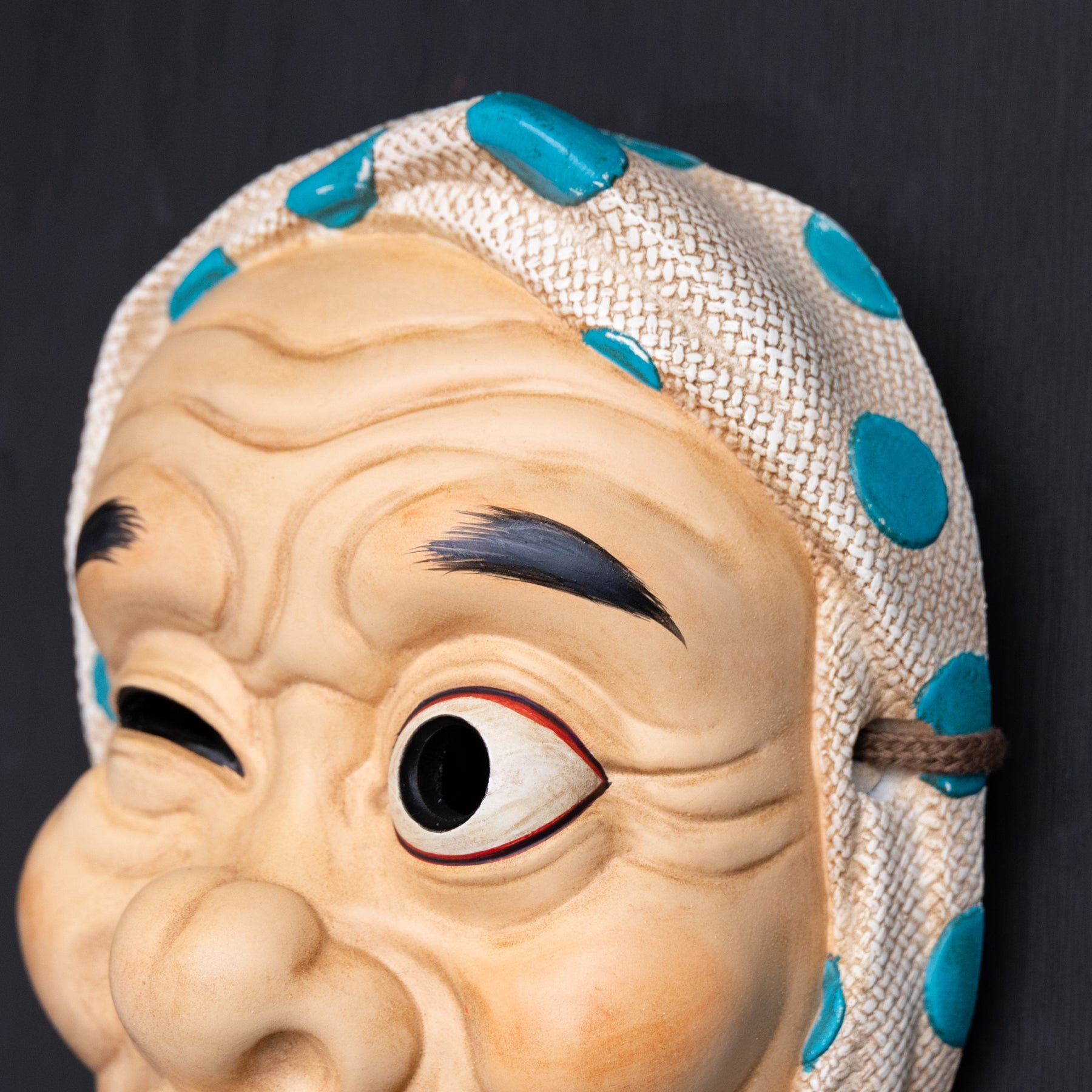 Hyottoko mask.