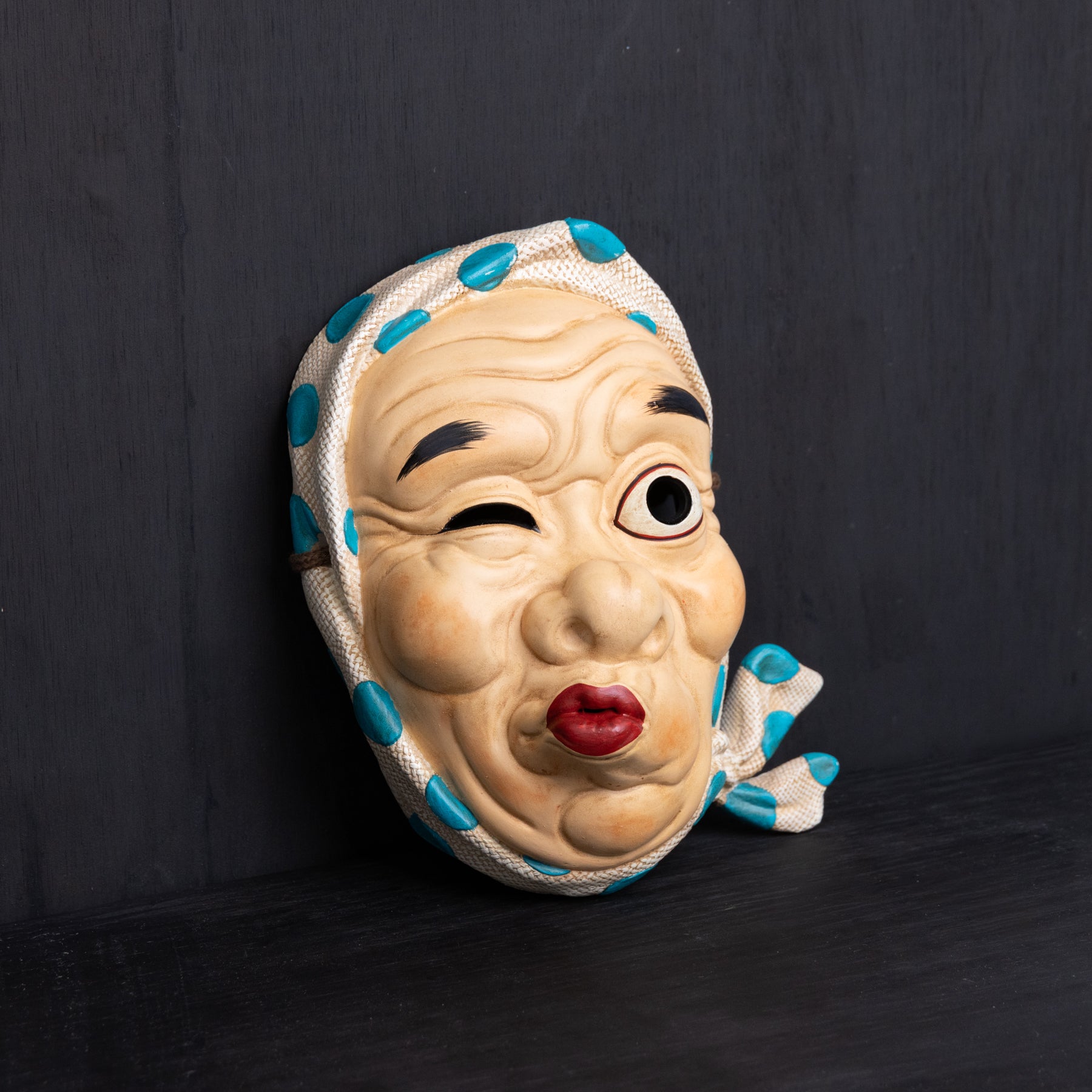 Hyottoko mask.