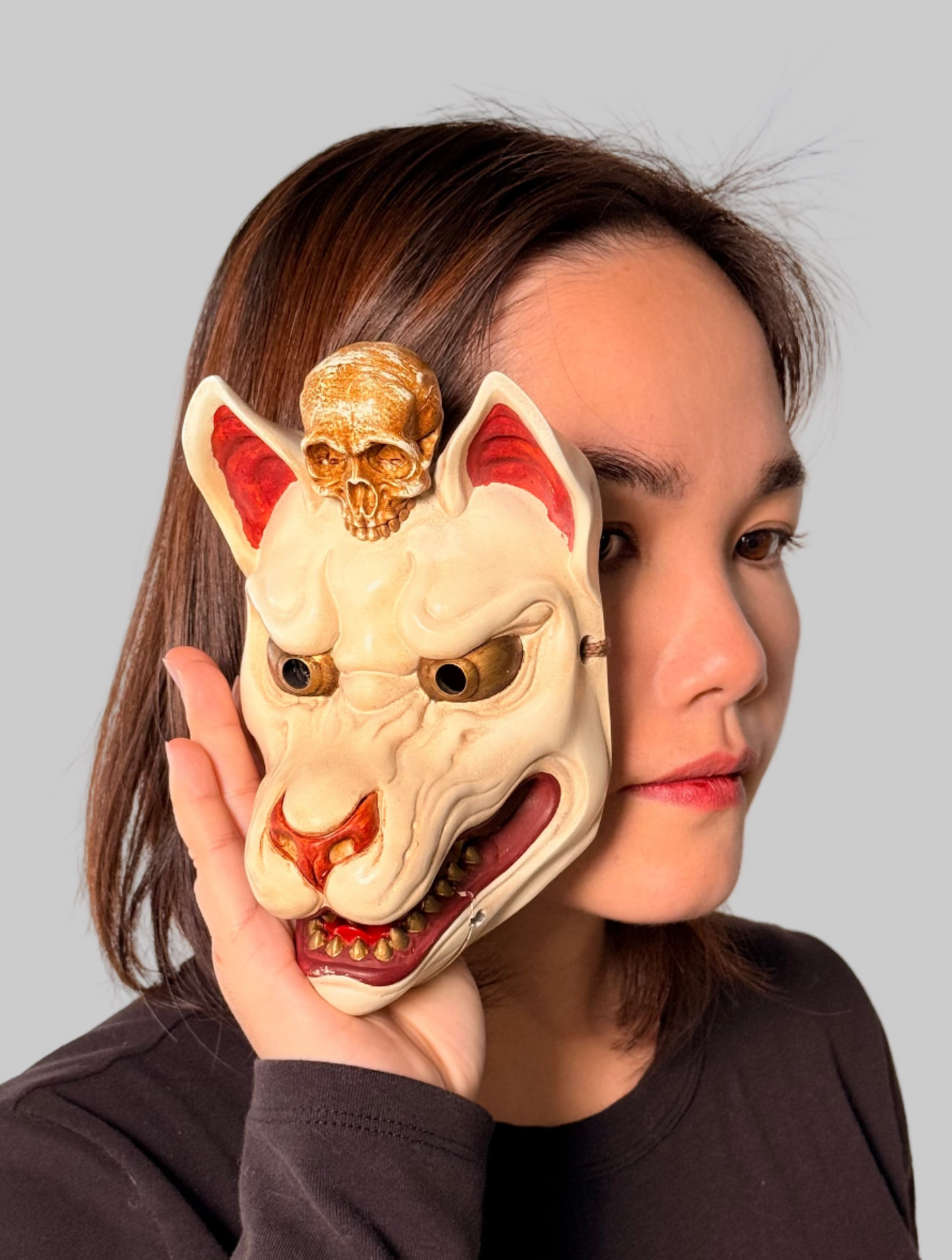 Kitsune Wearing a Skull.