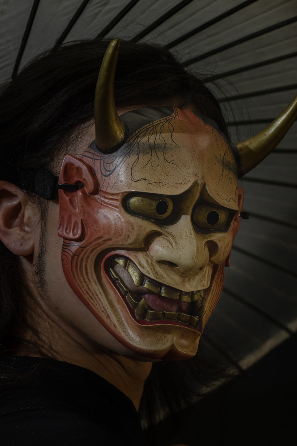 Model wearing the White Traditional Hannya Mask