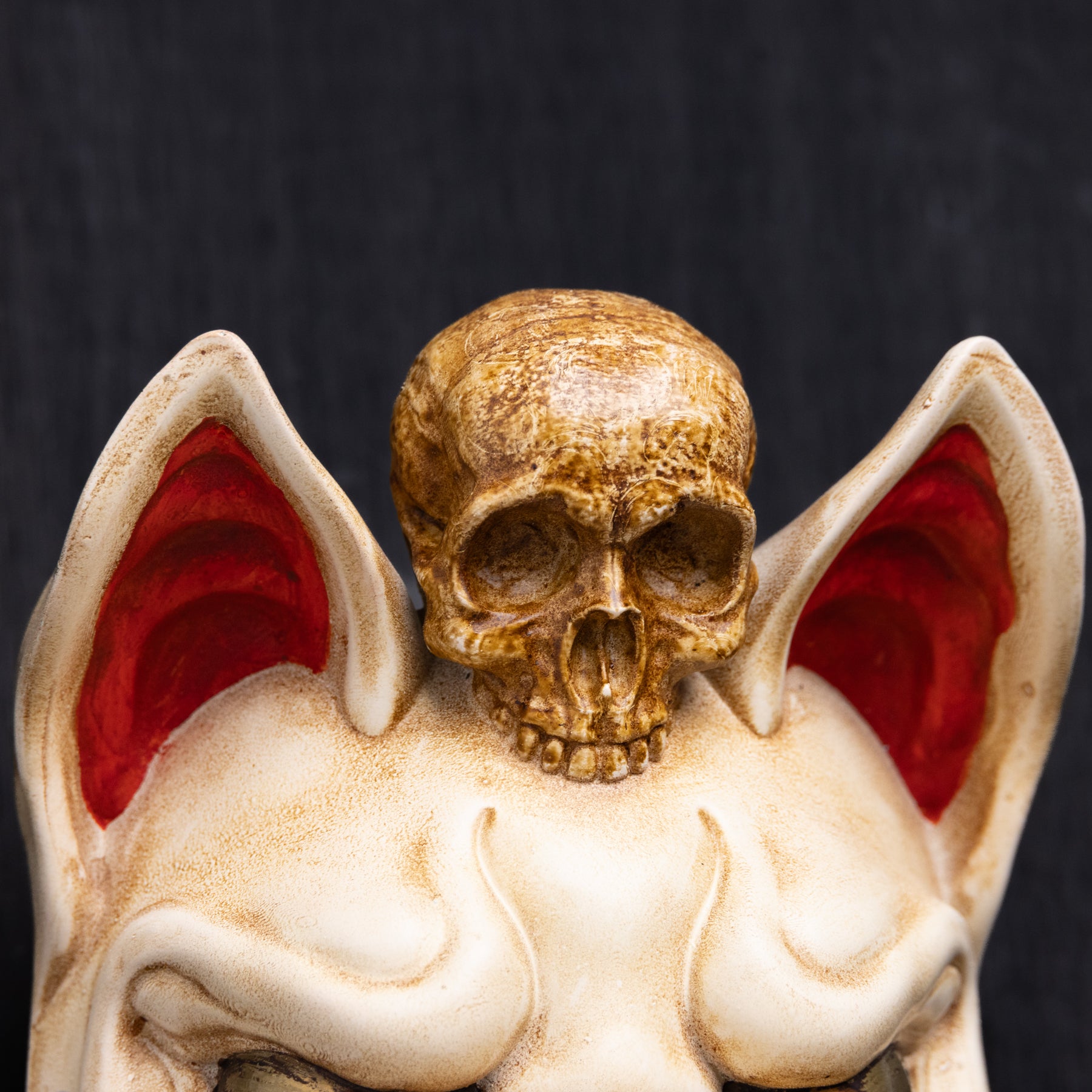 Kitsune Wearing a Skull.