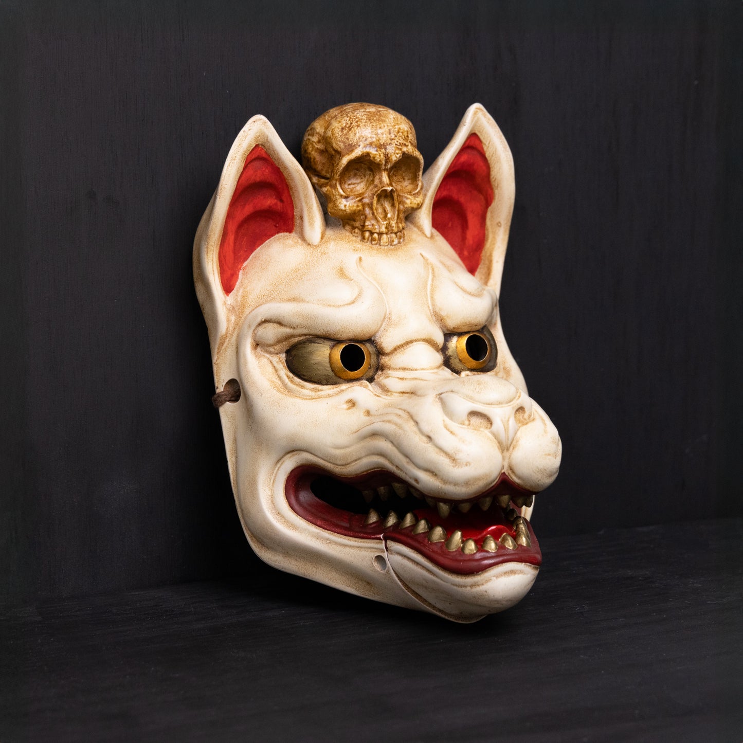 Kitsune Wearing a Skull.