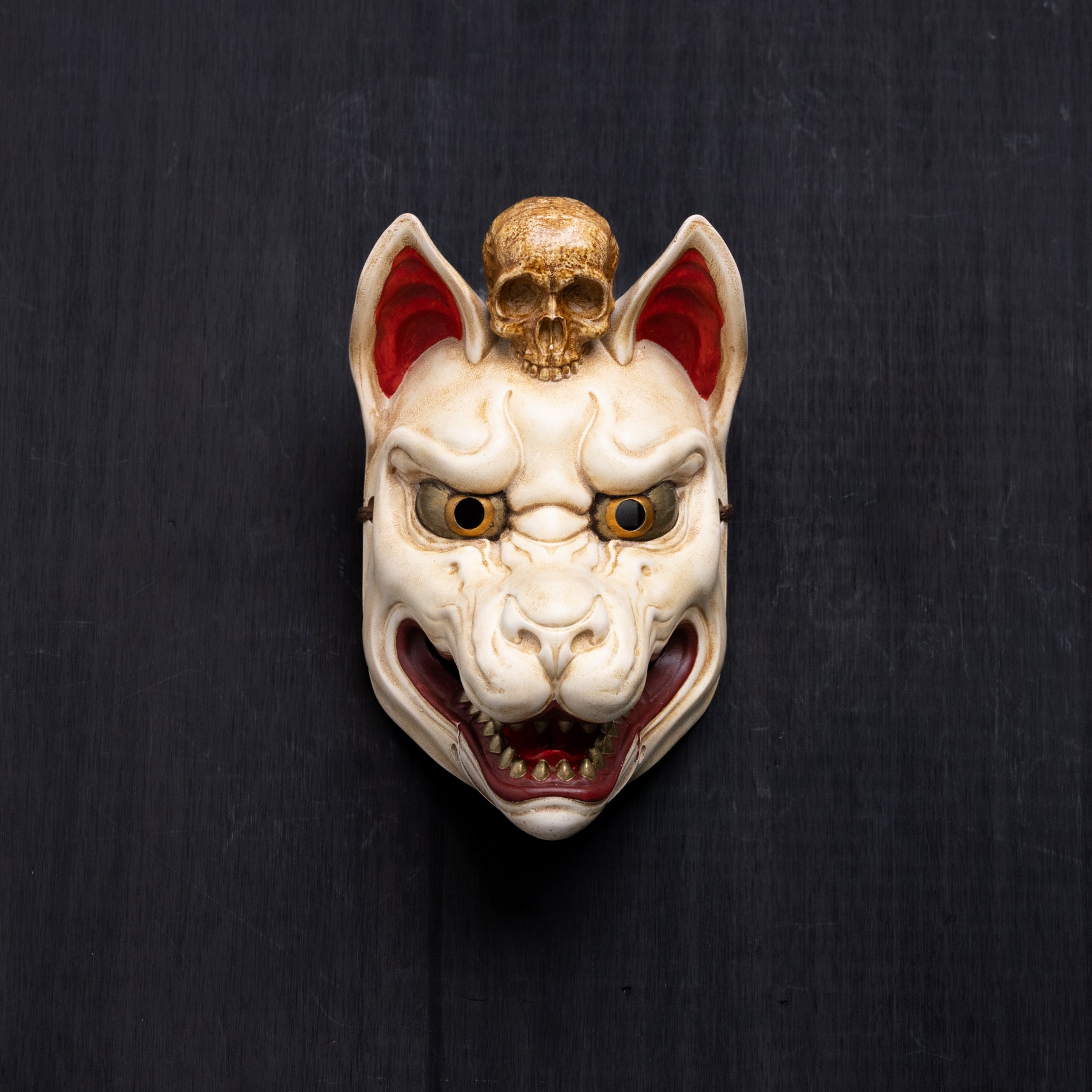 Kitsune Wearing a Skull.