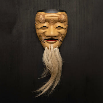 Okina Mask on wall