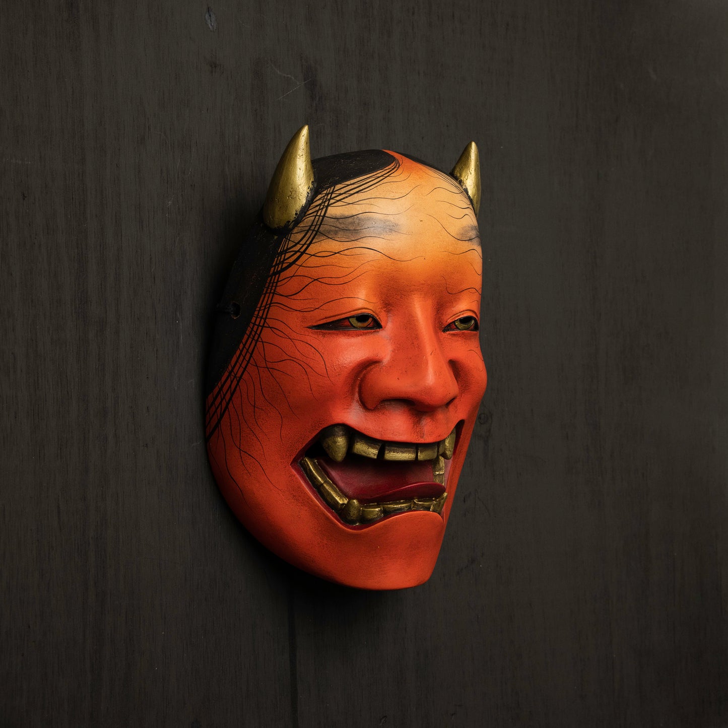 Red Namanari Mask on the wall